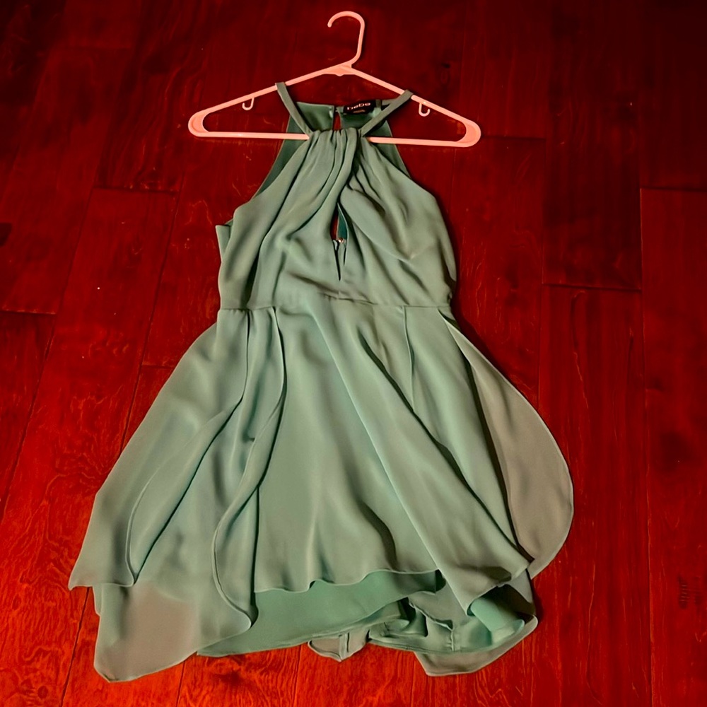 Bebe skater skirt dress. Keyhole opening. Back zip. Size 2. Mint Green.